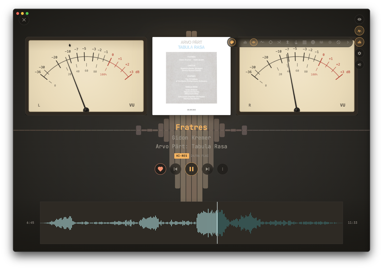 Now Playing with warm ambient background and VU meters